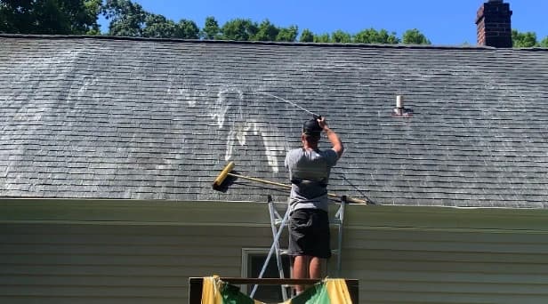 Before and after results of roof washing by Tallmadge Power Washing in Tallmadge